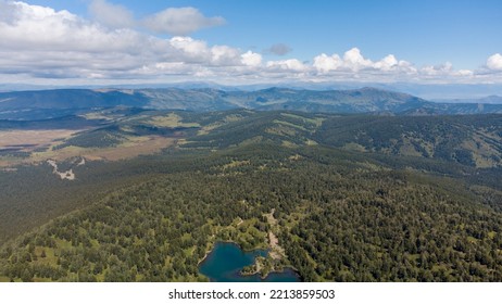 Turquoise Lake In The Taiga.Photos Of Wildlife Without A Person. Photos Of The Republic Of Mountain Altai In Summer, 