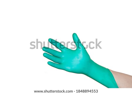 turquoise medical glove on the hand. Medical safety and hygiene. the image illustrates the concept of purity.