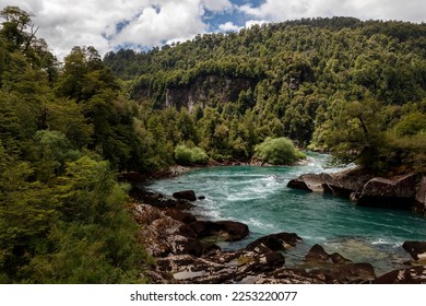 Turquoise mountain river Futalefu flows through dense vegetation, National Park Los Alerces, Region de los Lagos, Patagonia, Chile - Shutterstock ID 2253220077