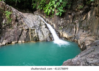 Turquoise Pool With Waterfall 