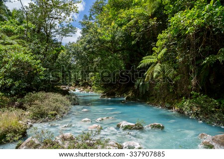 the turquoise river Rio Celeste in Costa Rica in the jungle