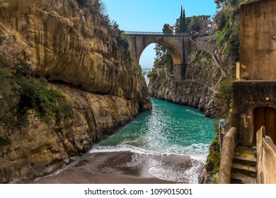 A Turquoise Sea Rushes Up The Beach At Fiordo Di Furore On The Amalfi Coast, Italy 