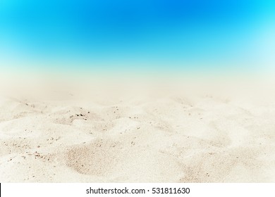 Turquoise sea and white sand background at summer day. Sandy beach wallpaper.