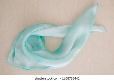 Turquoise Silk - Close Up Of A Hand Painted Silk Scarf - Pastel Tone On White Transparent Silk