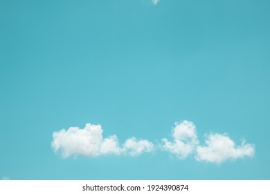 Turquoise Sky With Clouds In Close-up
