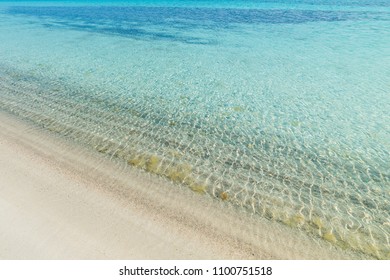 turquoise water and white sand in Lu Impostu beach, Sardinia