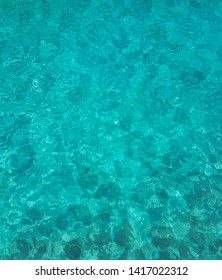 Turquoise Waters On The Indian Ocean Beach In The Maldives