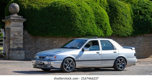 Turvey, Bedfordshire, UK - June 12th 2022. 1992 Silver Ford Sierra Cosworth