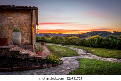 Tuscan Countryside With Amazing Sunset In The Background