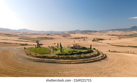 A Tuscan villa in the middle of a field, Val d'Orcia, Italy