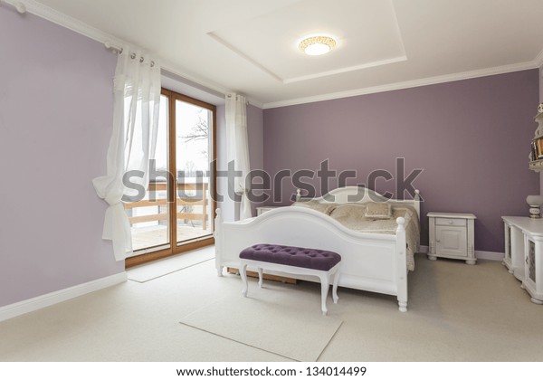 Tuscany Interior Purple Bedroom White Furniture Stock Photo