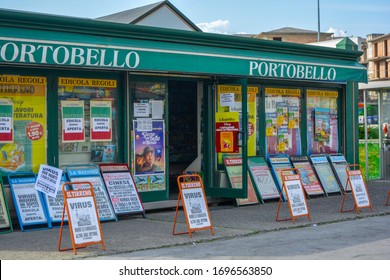 Tuscany, Italy, 03/30/20 - Italian Green Newsstand With Front Page Banners About COVID-19. News About Pandemic Of Coronavirus, Anxiety And Panic Covers And Make Headlines Of All Newspapers, Magazines