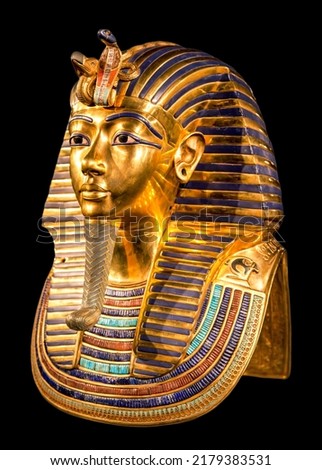 Tutankhamun's golden burial mask on black bacground. King Tut.