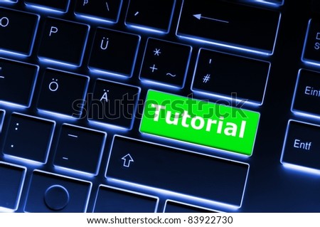 tutorial key with word showing internet or online software education concept