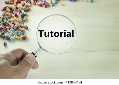 Tutorial text written on magnifying glass