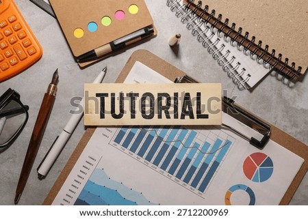 tutorial word written on wood block, concept.