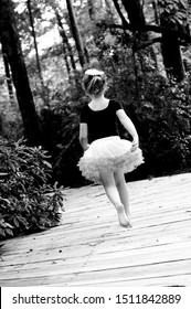 Tutu Girl Running Away In Park