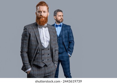 Tuxedo men wear menswear fashion. Elegant men in formalwear with bowtie. Two businessmen at business event. Tuxedo men in menswear isolated on grey. Tuxedo men in menswear. Copy space