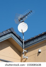 TV Antenna Installed On The Roof Of A House