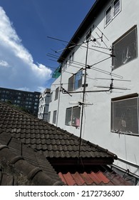 TV Antenna Installed Top Of The Tile Roof.