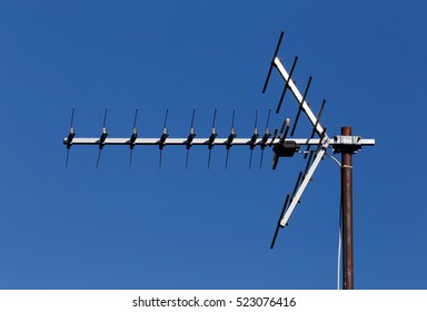TV Antenna For Receiving Terrestrial Television UHF Band Against The Blue Sky.