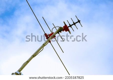 tv antenna uhf vhf blue sky background