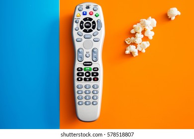 Tv Cable Remote And Popcorn. Watching Tv. Life Style, Entertainment, Young People. Fashion, Design And Interior Concept