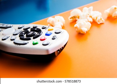  Tv Cable Remote And Popcorn. Watching Tv. Life Style, Entertainment, Young People. Fashion, Design And Interior Concept