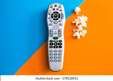 Tv Cable Remote And Popcorn. Watching Tv. Life Style, Entertainment, Young People. Fashion, Design And Interior Concept