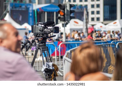 TV Camera Operator at the live event. Television. Telecast. Correspondent. Viewers
