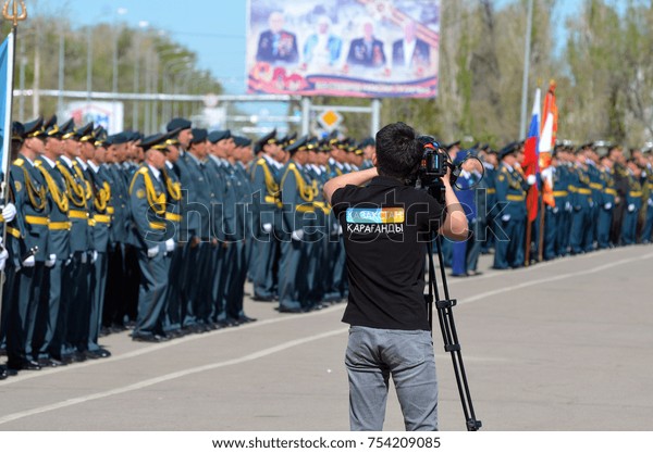 TV Karaganda chanel\
operator.Kazakhstan army parade.V-day celebration.Sary\
Shagan.Former Soviet anti-ballistic missile testing range.West Bank\
of Balkhash lake .May 9,\
2017.Priozersk.Kazakhstan\
\
