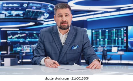 TV Live News Program: Charismatic White Male Presenter Reporting. Television Cable Channel Anchorman Or Host Talking About Important Events. Network Broadcast Mock-up. Modern Newsroom Studio