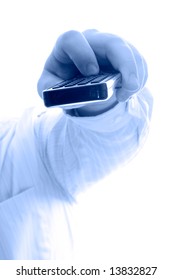  TV remote control device in hand