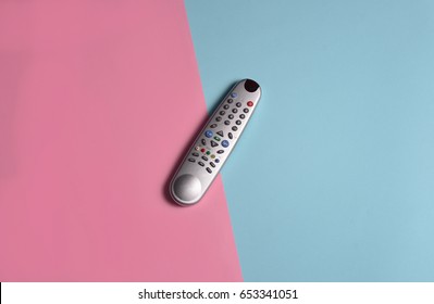 TV Remote Control On A Pastel Colors Surface. Top View. Flat Lay. 