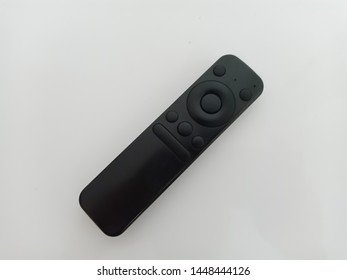 TV remote on white background