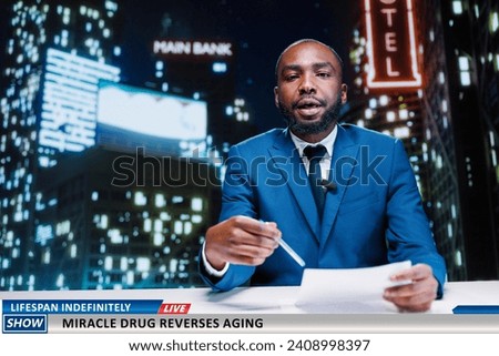 TV reporter discusses about anti aging drug discovered by medical scientists, miraculous experiment to preserve youth and stop growing old. African american newscaster on night show.