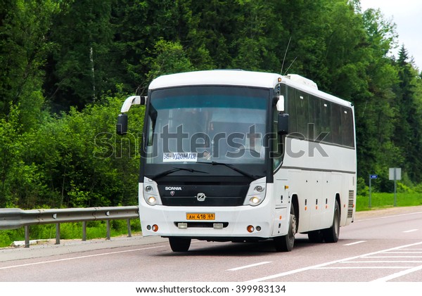 TVER REGION, RUSSIA - MAY\
28, 2013: White intercity coach GolAZ 52911 Cruise at the\
interurban road.