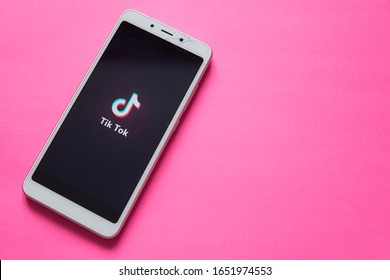 Tver, Russia - February 12, 2020; Tik Tok Logo On Smartphone Screen On Pink Background. Tik Tok Icon. Tik Tok Application. Tiktok Social Media Network. Space For Text.