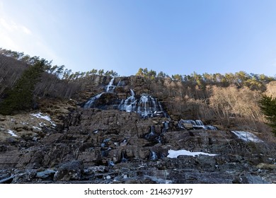 Tvindefossen Waterfall Water Flowing Down The Mountain In Voss, Norway On A Sunny Day