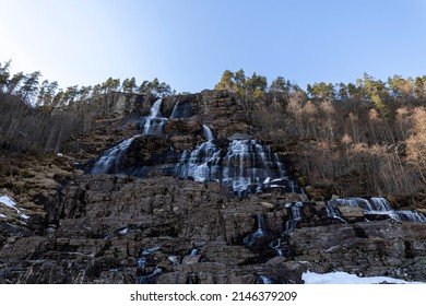 Tvindefossen Waterfall Water Flowing Down The Mountain In Voss, Norway On A Sunny Day