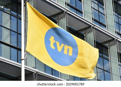 TVN Polish TV Channel Flag With Logo Near TV Station. WARSAW, POLAND - AUGUST 21, 2021