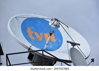 TVN Satellite Antenna With Logo On The Roof On TVN Polish TV Station. WARSAW, POLAND - AUGUST 21, 2021