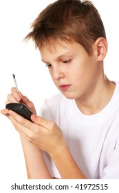 Tween Boy Texting With A Mobile Phone