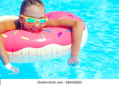 Tween Girl Relaxing On Donut Lilo Stock Photo 584418601 | Shutterstock