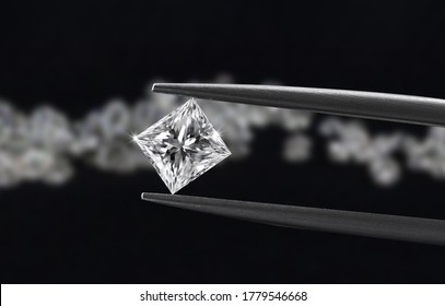 Tweezers hold Big Princess Cut Diamond on blur diamond and black background