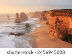 The Twelve Apostles in The Great Ocean Road (Victoria, Australia) at sunset. Wind and wave erosion shape rocks into stunning cliffs and promontories by the Southern Ocean.