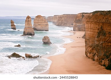 twelve apostles sea stacks rock formations, overcast rainy day, great ocean road, Victoria Australia - Powered by Shutterstock