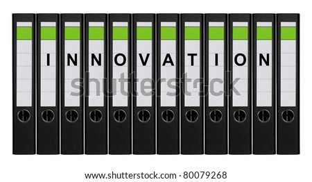Twelve ring binders labeled INNOVATION standing side by side.