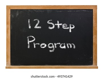 Twelve Step Program Written In White Chalk On A Black Chalkboard Isolated On White