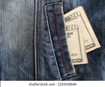 Twenty Dollars Banknote Cash In Blue Jean Jacket Pocket With Blank Space Which Can Be Used As Copy Space At The Left Side